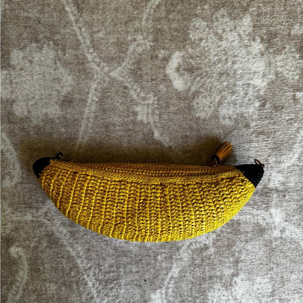 ANYA HINDMARCH
Banana Raffia Crossbody Bag